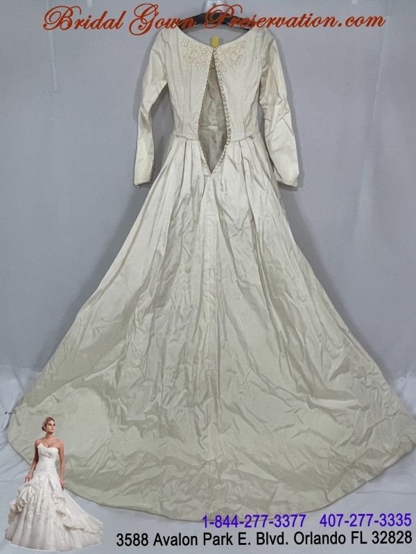 60 year old wedding gown now restored-Restoration