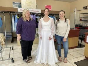 Wedding Gown restoration 35 year old;Bride happy and excited to wear the restored wedding gown; 